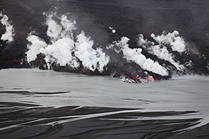 Glowing lava flow interacts with Jokulsa a Fjollum river, Holuhraun fissure eruption of Bardarbunga volcano, Iceland