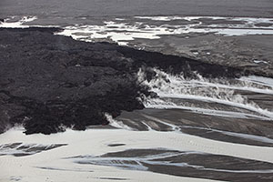 Lava field as it interacts with Jokulsa a Fjollum river, Holuhraun fissure eruption of Bardarbunga volcano, Iceland