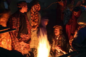 Pilgrims by fire in Pura Luhur Poten temple at Yadnya Kasada festival
