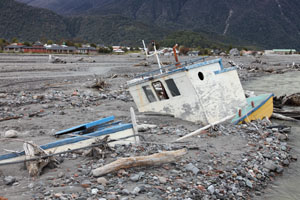 Fishing Boat buried in lahar deposits, Chaiten