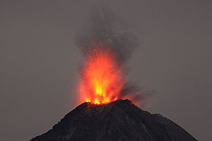 Brightly incandescent Nighttime eruption, Fuego de Colima volcano, Mexico