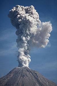 Tall ash cloud from Colima volcano, Mexico