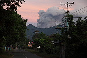 Morninglight view of ash cloud of Dukono Volcano seen from Tobelo town