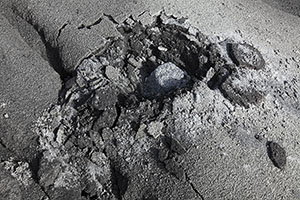 Impact crater of small volcanic bomb, Dukono volcano