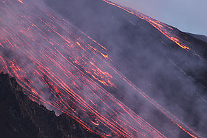 Paroxysmal eruption, Mount Etna Volcano, April 1st 2012. Lava flows.