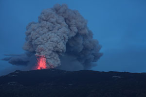 Eyjafjallajökull volcano erupting at dusk