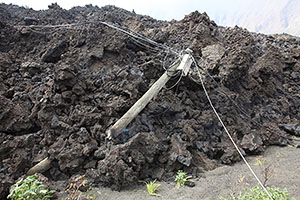 Electricity pole broken by lava flow, Fogo volcano