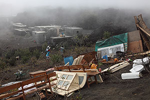 Hillside refuge for inhabitants of Portela overlooking flow deposits, Fogo Volcano Eruption 2014