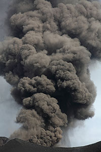 Ash cloud billowing out of crater. Fogo volcano, 2014, Vertical shot