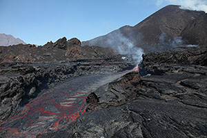 Incandescent lava flow in small canyon, Fogo Volcano, Cabo Verde