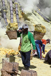 Kawah Ijen volcano, Solfatara, Sulfur Mine, Sulphur, Worker carrying sulfur in baskets
