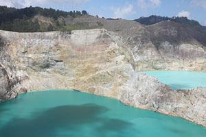 Kelimutu volcano, colourful crater lakes with cloud shadow, Flores, Indonesia