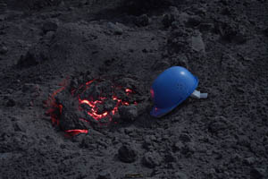 Krakatau Volcanic bomb with helmet for scale