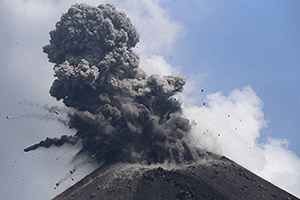 Volcanic bombs with ash trails ejected by Anak Krakatau volcano