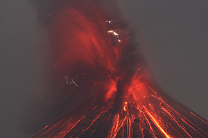 Summit of Anak Krakatau during nighttime Strombolian Eruption with Lightning