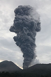 Towering ash cloud rising from Lokon-Empung volcano, Kawah Tompaluan crater, 6th December 2012
