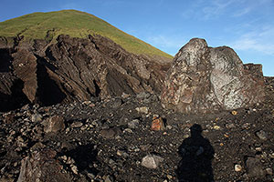 Volcanic bomb on crater rim of Lokon-Empung volcano