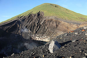 Volcanic bomb on crater rim of active Lokon-Empung volcano, Indonesia