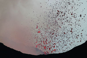 Nyamuragira Volcano eruption 2011 / 2012 - shower of small volcanic bombs blown out of crater