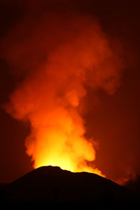 Nyamuragira Volcano incandescence from crater illuminating gas cloud