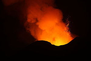 Nyamuragira Volcano cone erupting during night