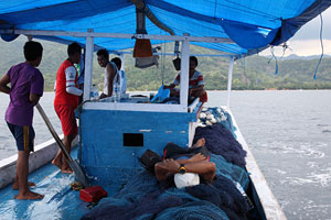 Travelling on fishing boat on Paluweh island