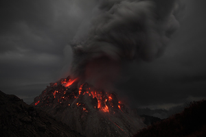 Nighttime ash venting forming ash cloud, Paluweh volcano