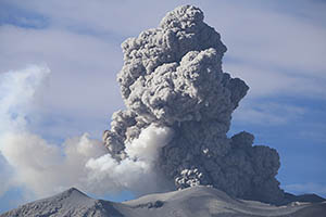 Ash cloud from summit crater of Sabancaya Volcano