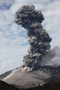 Towering ash cloud bent by wind, Sakurajima volcano