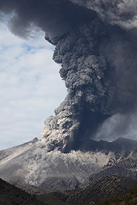 Impressive ash column rising from Sakurajima volcano following eruption