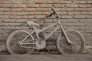 BMX bike coated in ash, Sinabung Volcano
